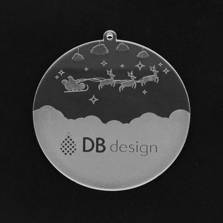 Adorno de árvore de Natal em acrílico transparente e usando o processo de gravação a laser.